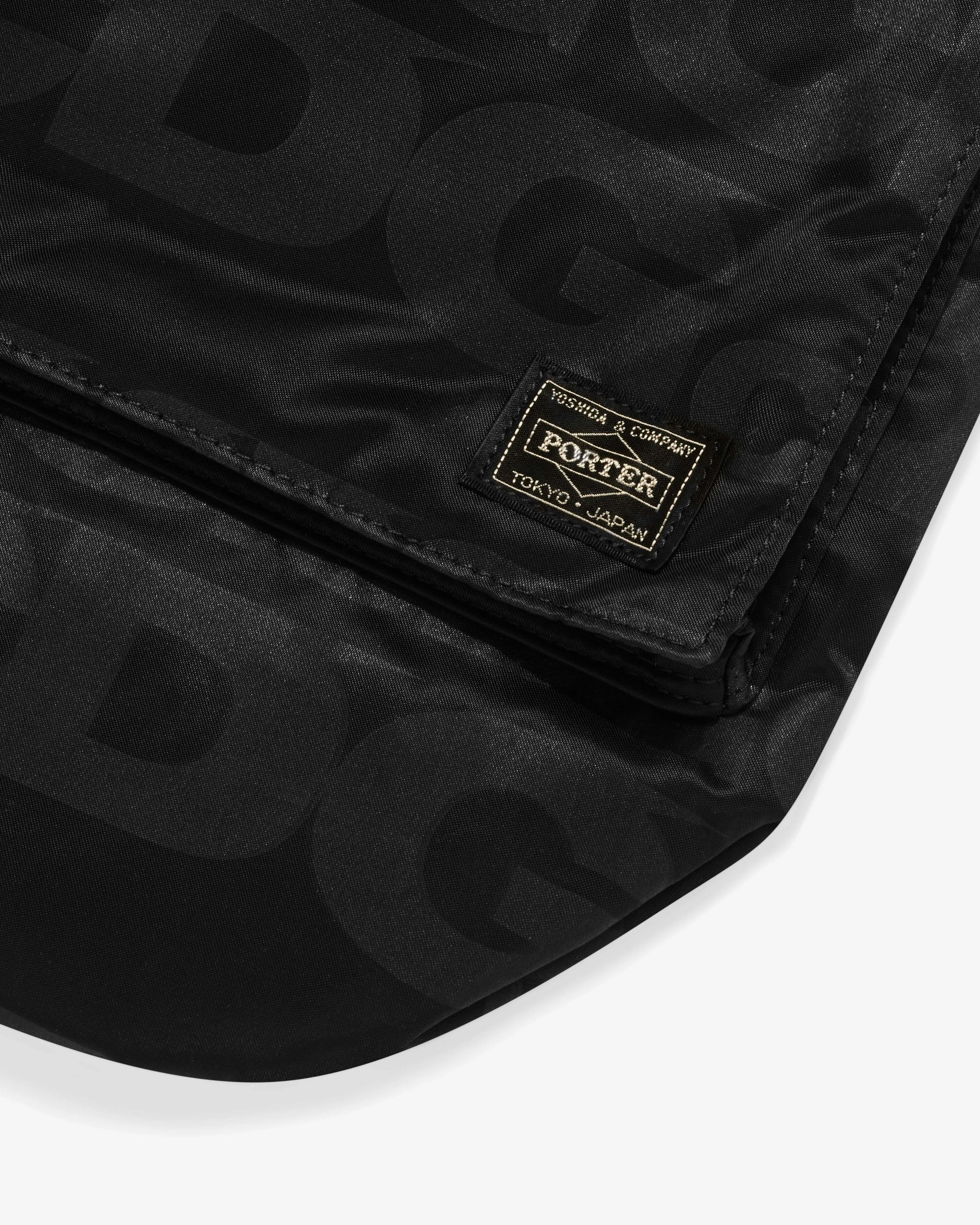 CDG Porter Yoshida Helmet Bag  Black