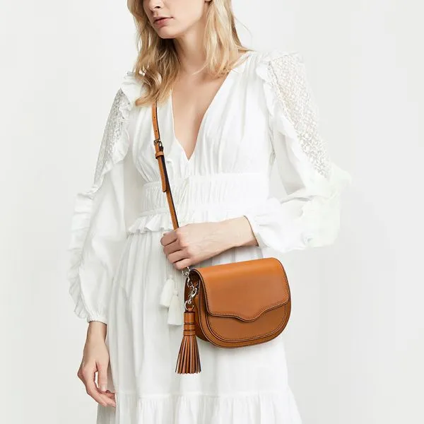 Women tassel saddle bag in genuine leather