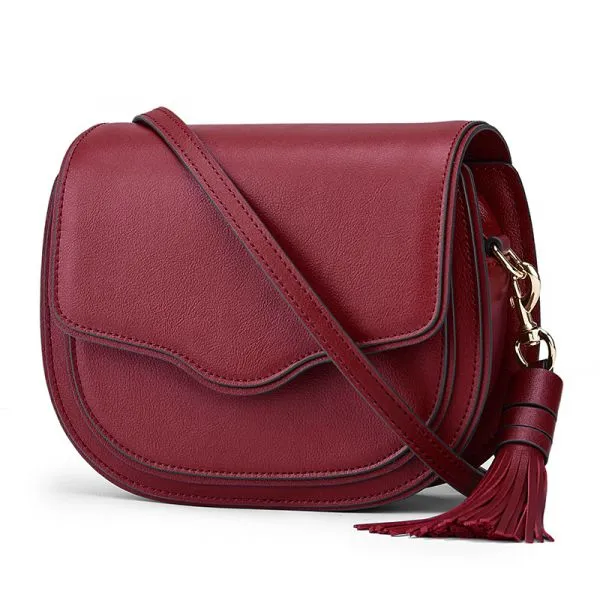 Women tassel saddle bag in genuine leather